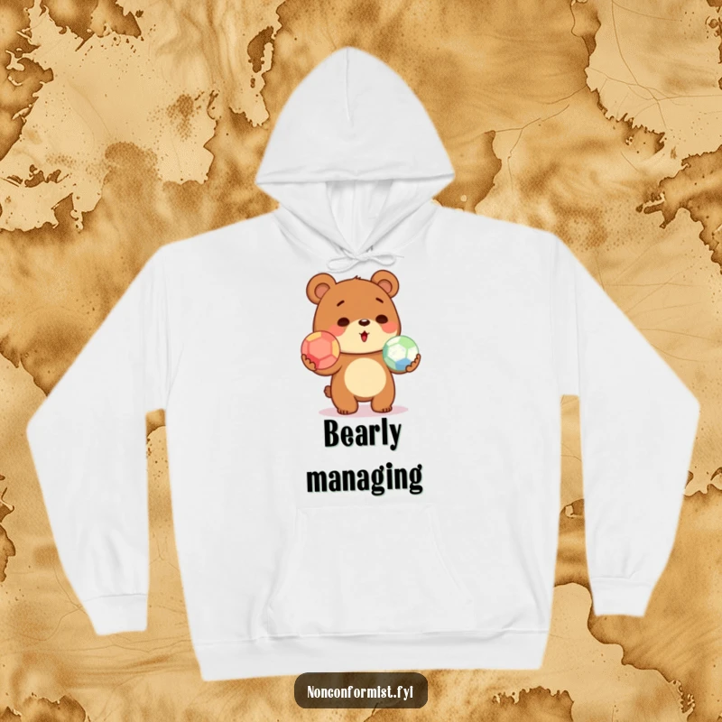 Cute bear character on a hoodie, hilariously trying to juggle three distinct colored balls, looking focused and slightly overwhelmed.