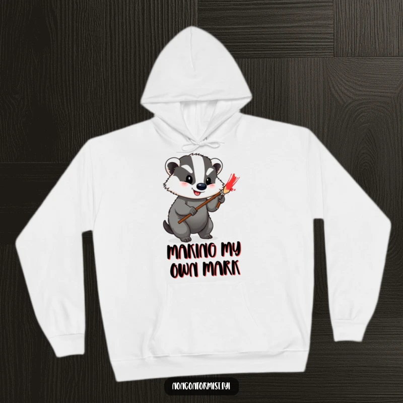 Funny Hoodie featuring a happy badger painting a bright red stripe on its grey fur, perfect for cozy creative time.