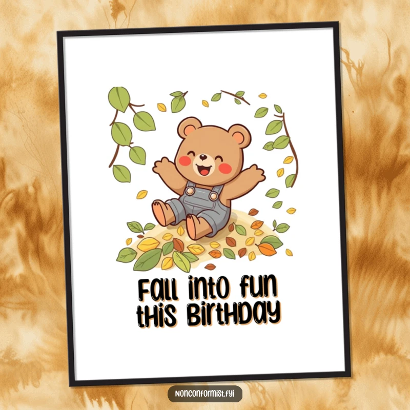 Funny free printable wall art: a playful bear character wearing overalls gleefully slides down a hill covered in colorful autumn leaves.