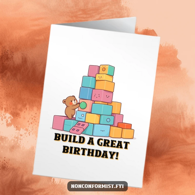 Funny Free Printable Birthday Card: Small bear building a lopsided, unstable tower of colorful blocks, charmingly imperfect.