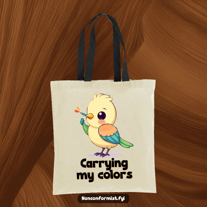 Funny bird tote bag featuring a colorful character painting a stripe onto its own wing, celebrating artistic endeavor.