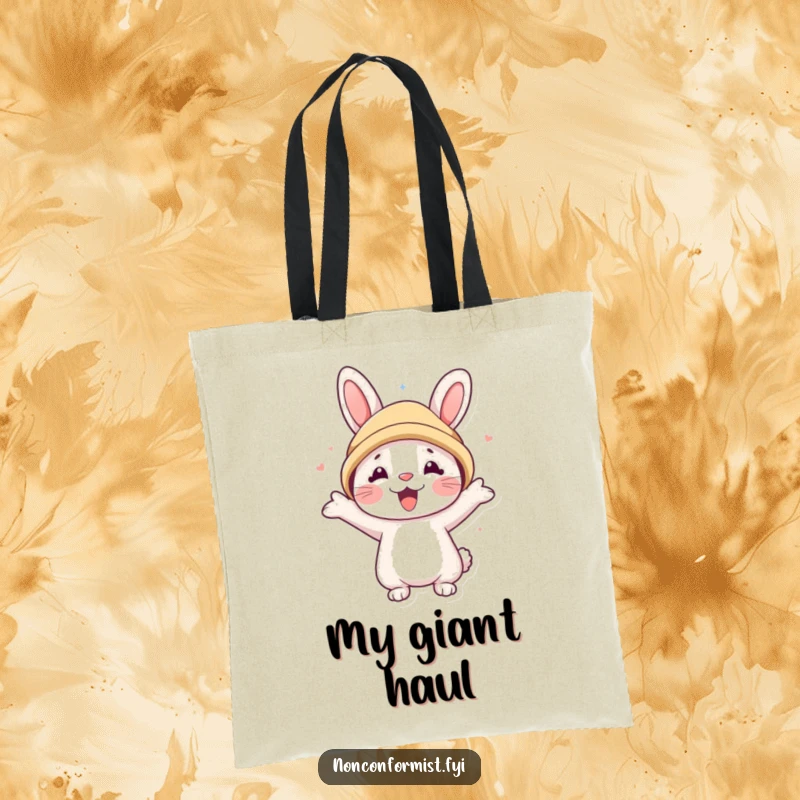 Funny tote bag featuring a happy rabbit character enthusiastically wearing a bear hat that’s much too big, bringing smiles.